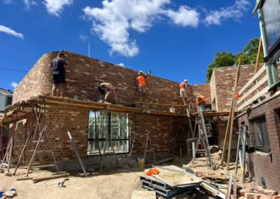 Brick renovation work underway on an older building structure